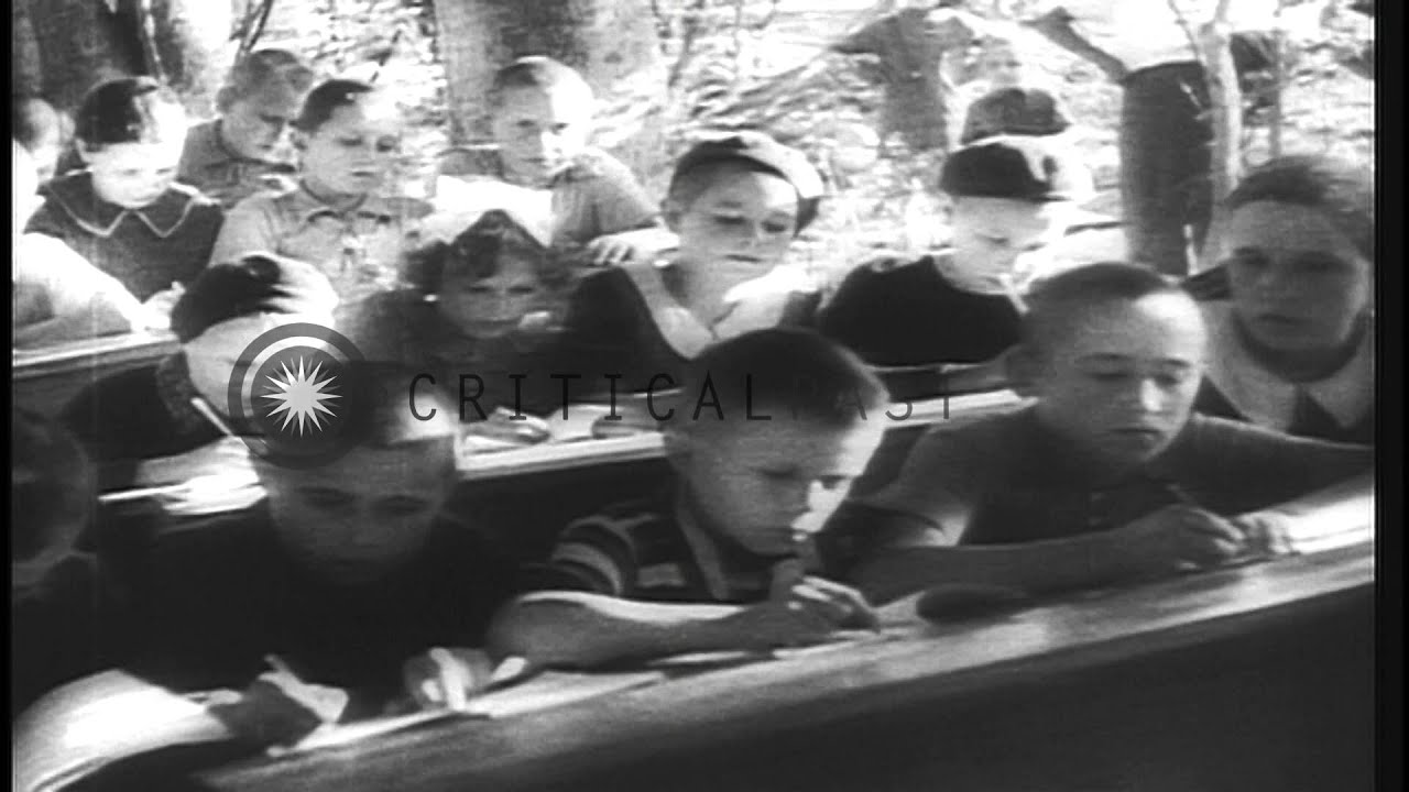 Polish refugees receive Red Cross aid as they reach Iran during World War II. HD Stock Footage