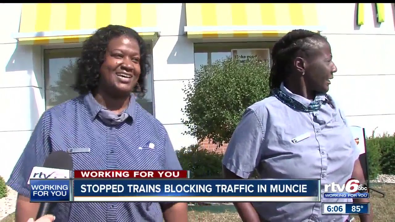 Stopped trains blocking traffic in Muncie
