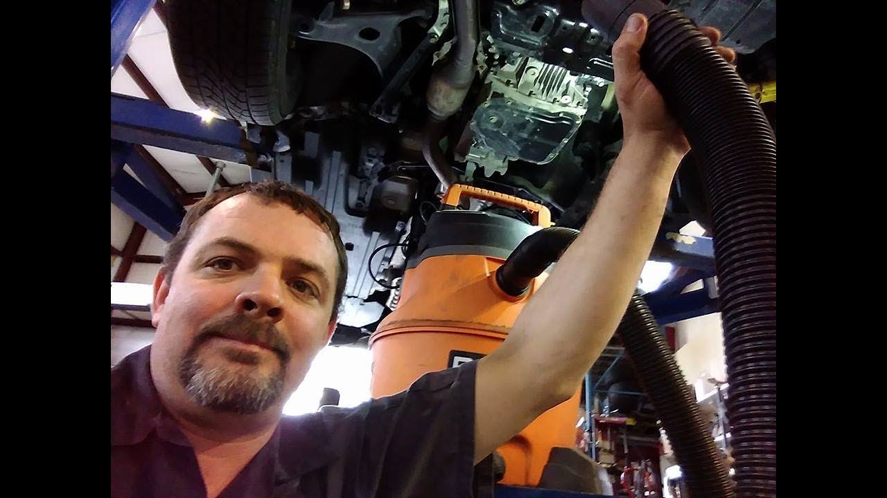 Using A Vacuum Cleaner To Change a Leaking  Drain Plug Gasket!?!?