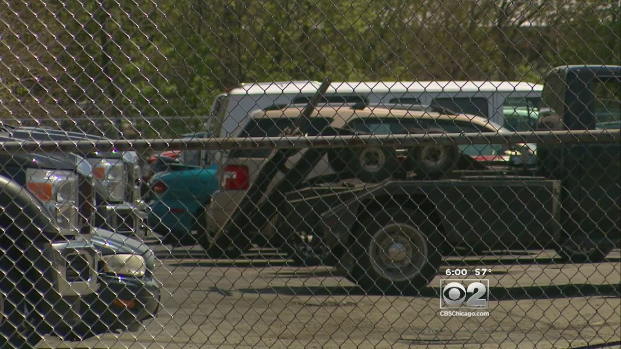Tow Truck Driver Pulls Car Away, With Kids Inside