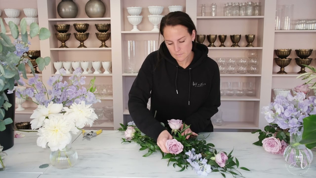 How to create a flower arrangement for a wedding arch | Add a flower