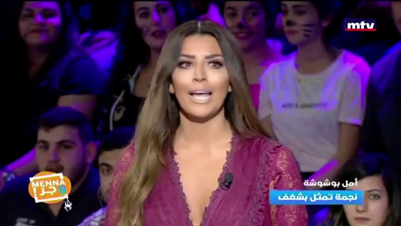 امل بشوشة توضح حقيقة صورها وتقول :لاتجادل الأحمق!... وصورة لزوجها وابنتها