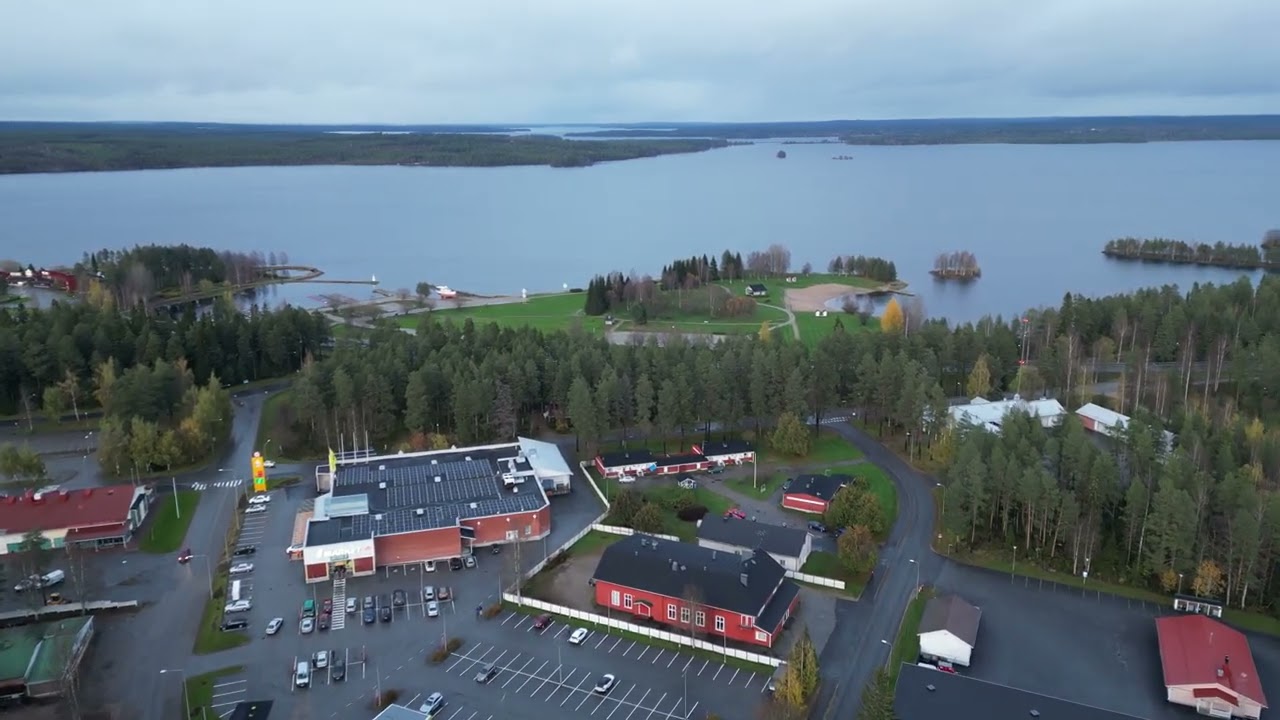 Drone sightseeingflight over Ämmänsaari village in Suomussalmi county,  Kainuu, Finland 16.10.23 III