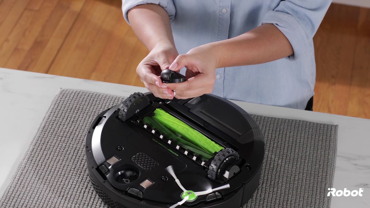Como limpar a roda guia dianteira - Roomba&reg; S&eacute;rie e e S&eacute;rie i