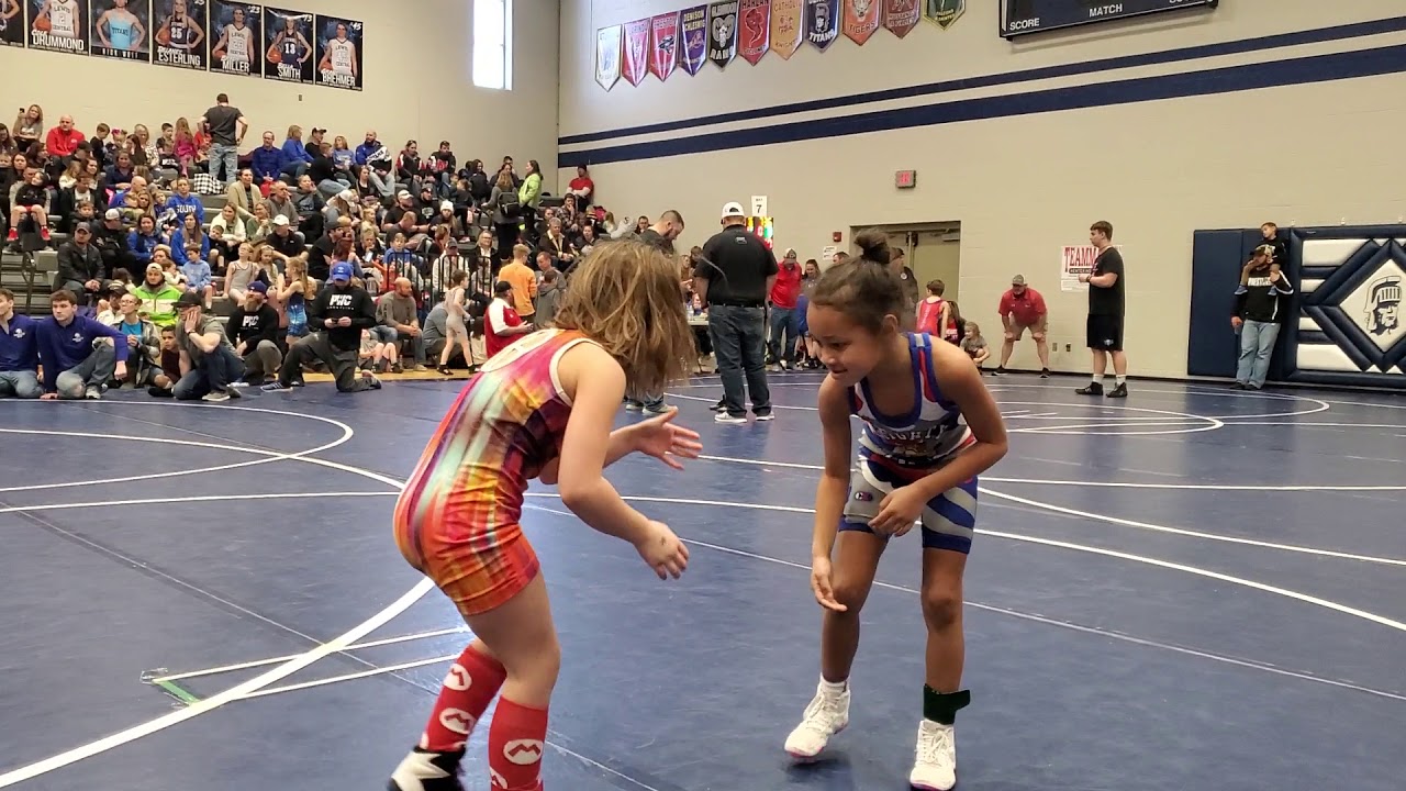 Girls wrestling Lyla gets pin 1st round