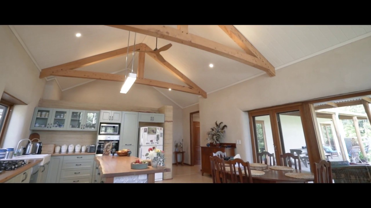 Walkthrough a grand design house, with straw bales, rammed earth walls, traditional timbers