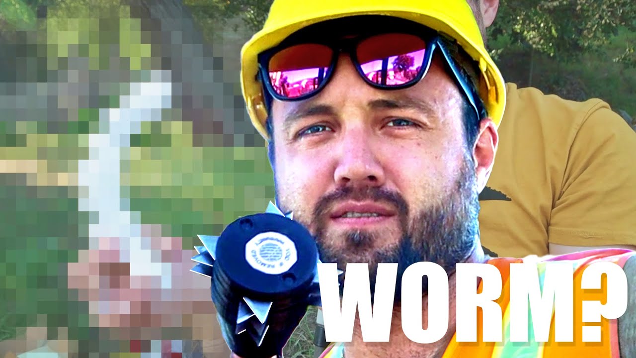 Construction worker UNBOXES excavator handles