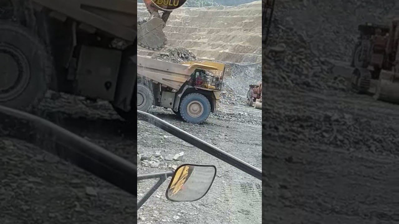 kegiatan lowding di tambang batu hijau PT macmahon indonesia
