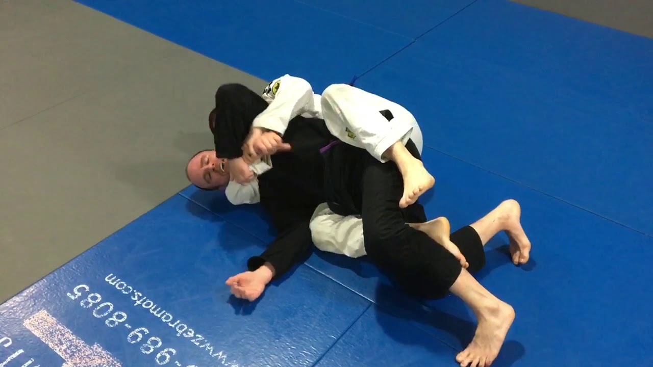Back mount escape to knee bar