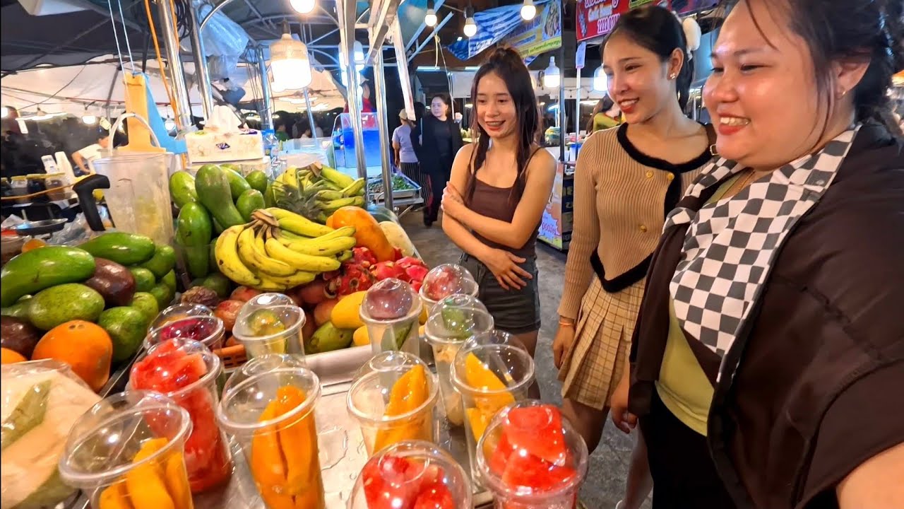 Beautiful night out with Lao ladies at the famous night market in Laos.