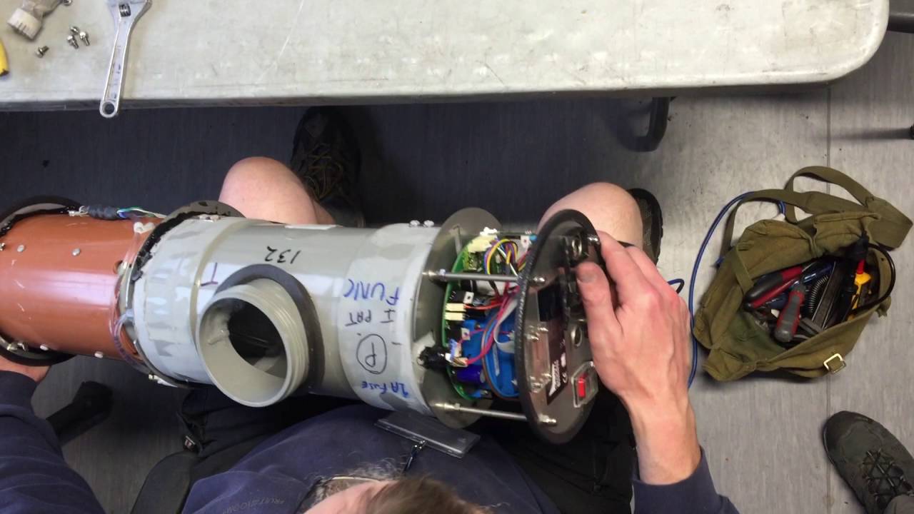 Repairing the dead snow machine.