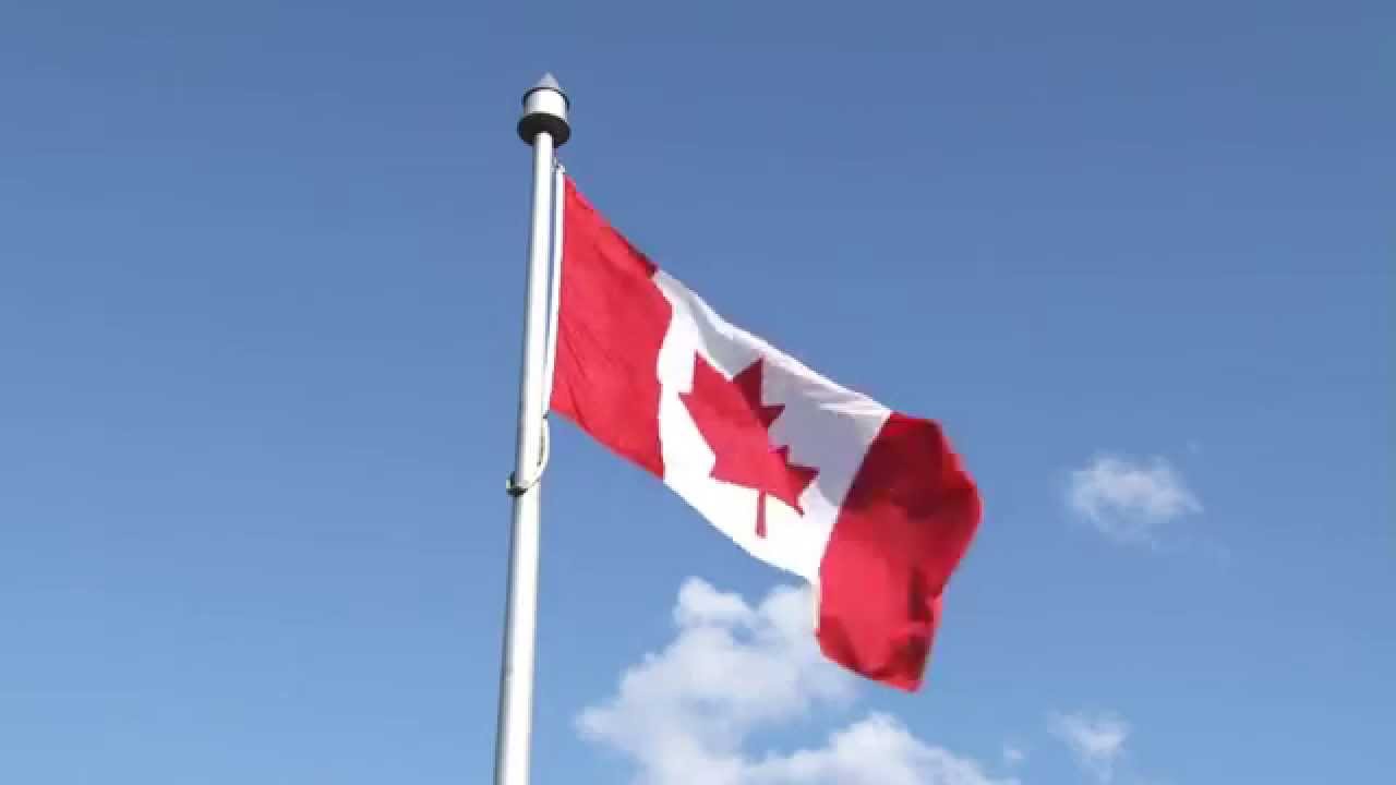 Free Stock Footage - Canadian Flag Close Up (Canada, Clouds, Blue Sky, Blowing in the Wind)