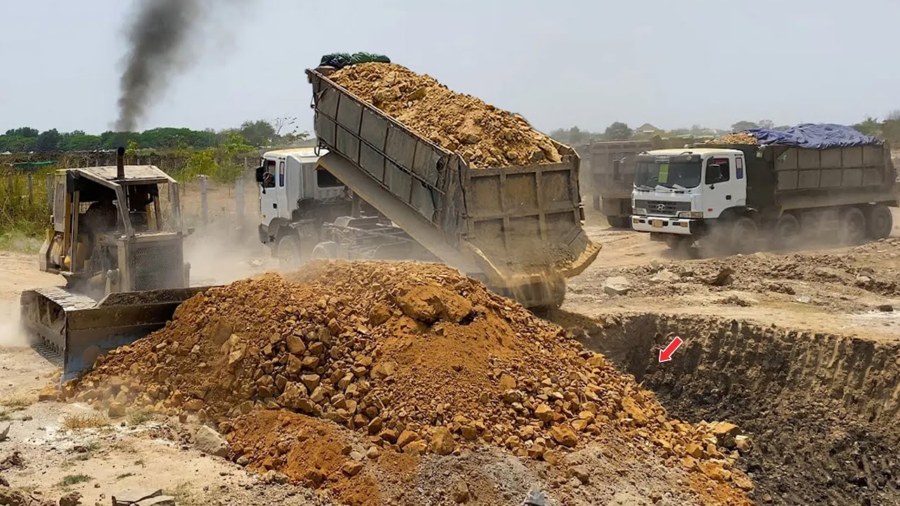Great Work Starting New Road And Finish By Heavy Dump Truck And Strong Bulldozer Pushing