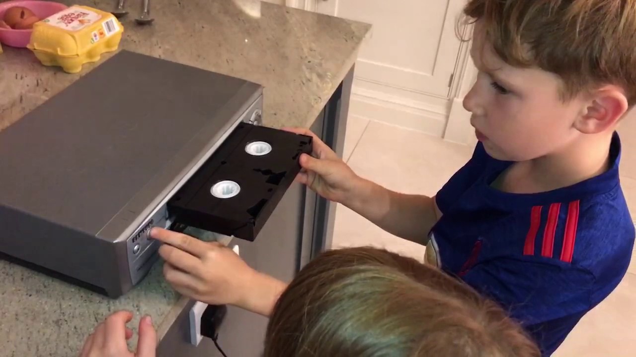 Kids see a vcr for the first time!