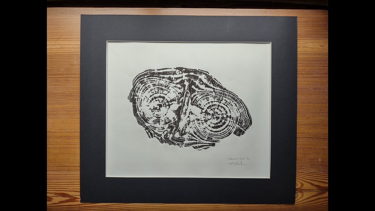 Tree Ring Woodcut prints using wet paper and dry feet.