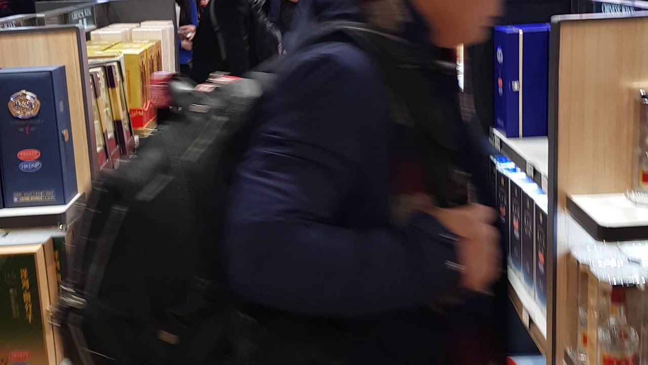 China Duty Free Shanghai Airport Very Busy People Buying as it is very Cheap