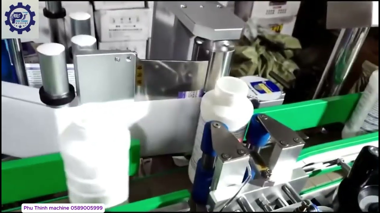 MÁY DÁN NHÃN CHAI TRÒN TỰ ĐỘNG.