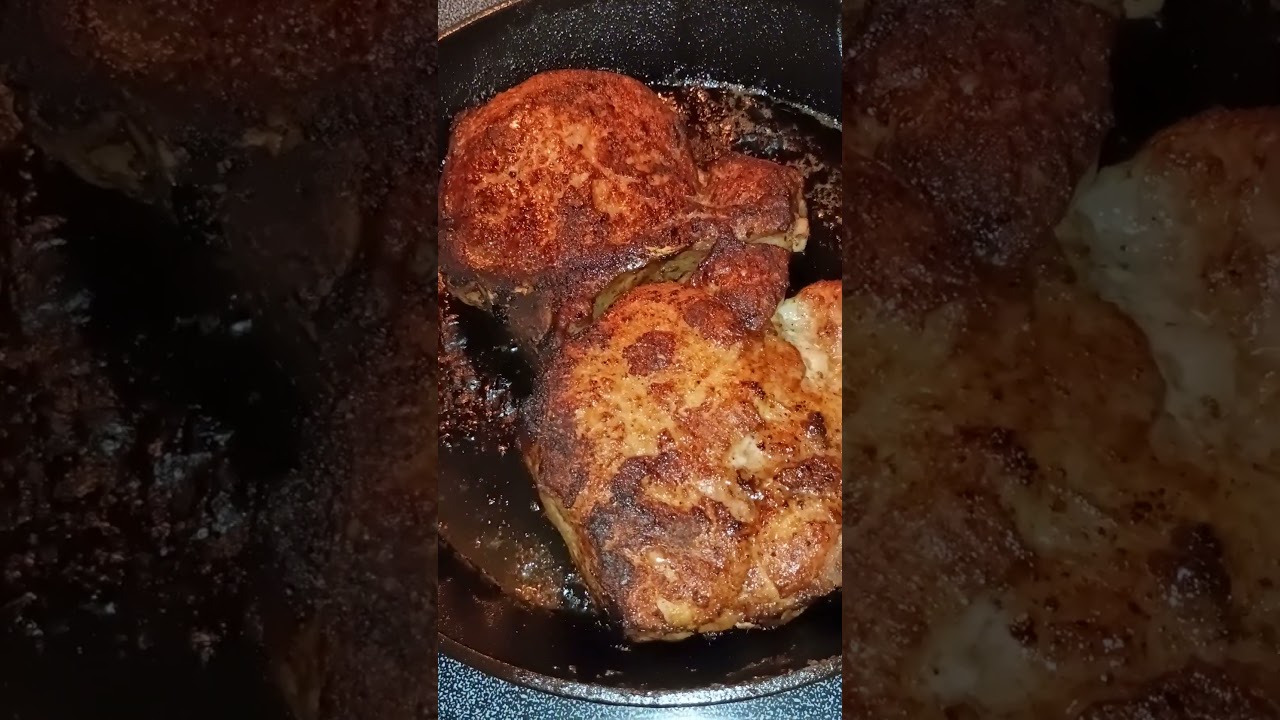 Sizzling pork chops in a cast iron skillet! Yummmmy!!!