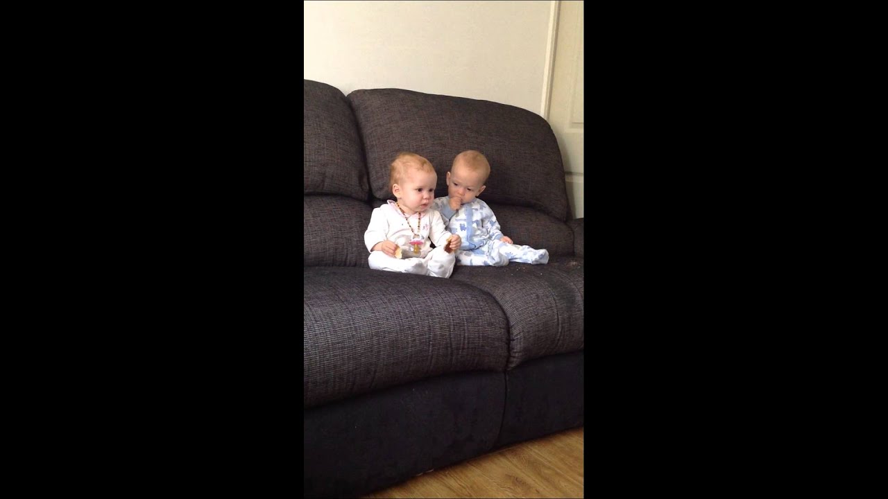 Twins fighting over toast