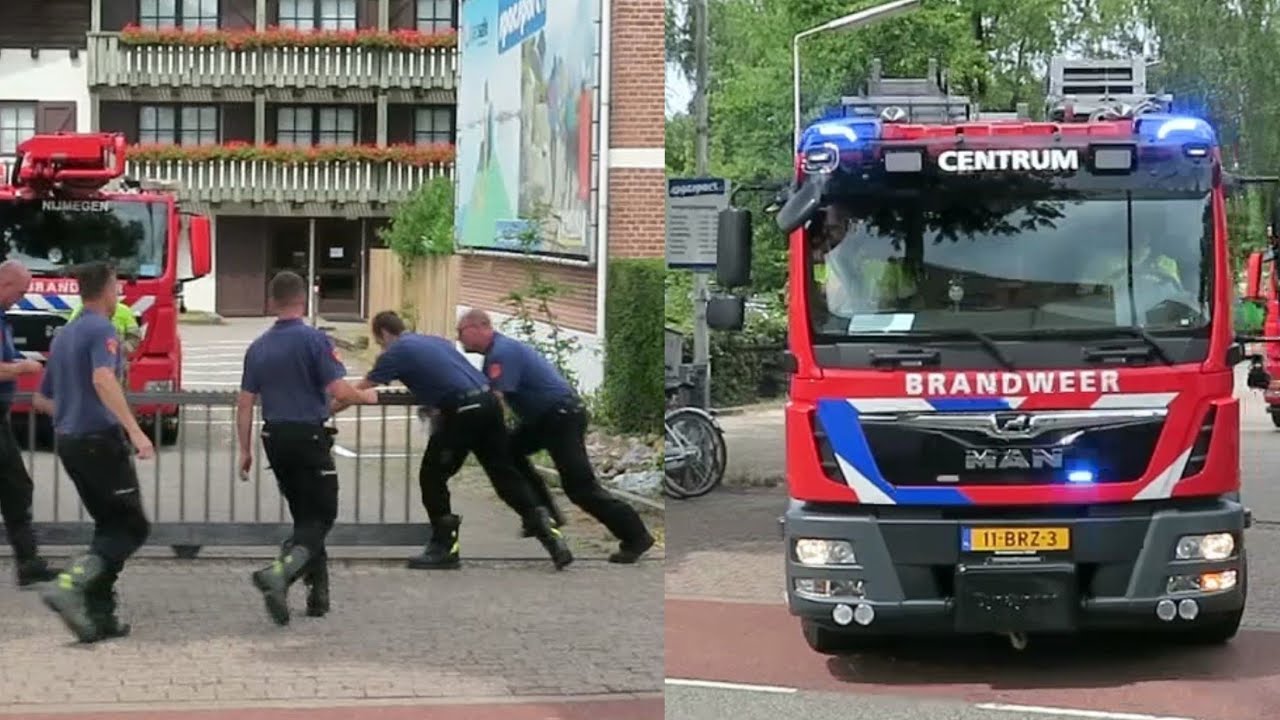 Brandweer Mannen rennen naar wagen voor prio 1 assistentie Ambulance tijdens Nijmeegse 4daagse