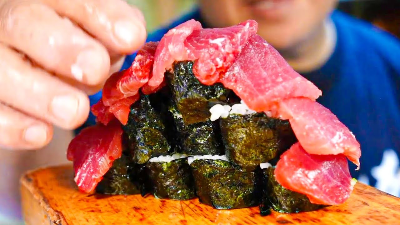 Слишком много обслуживания Японский паб с вкусными редкими кусками тунца.