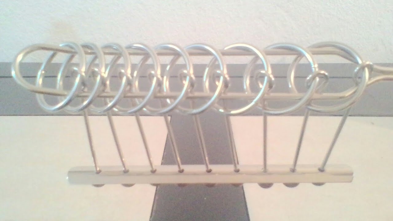 RETO 1. (!!Solución de alambrije de 9 argollas!!)