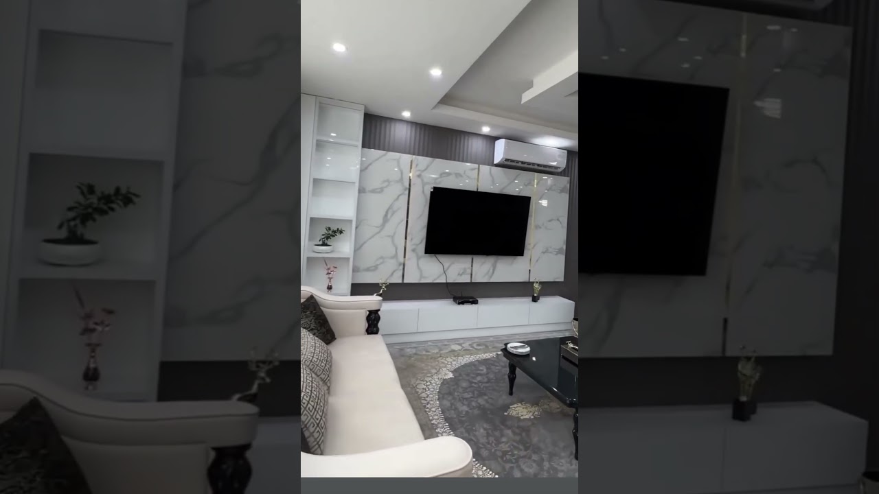 PREMIUM DESIGNED TV UNIT WITHTHECOLOUR COMBINATION OF GREY ANDMARBLE WHITE LAMINATE WITHLOUVERS