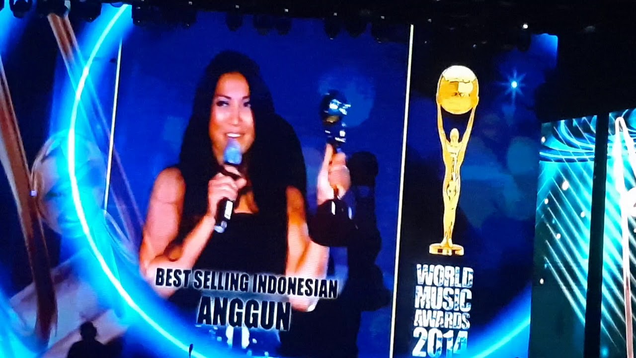 Anggun cited for her contribution to Asian TV, performs virtually with Luciano Pavarotti.