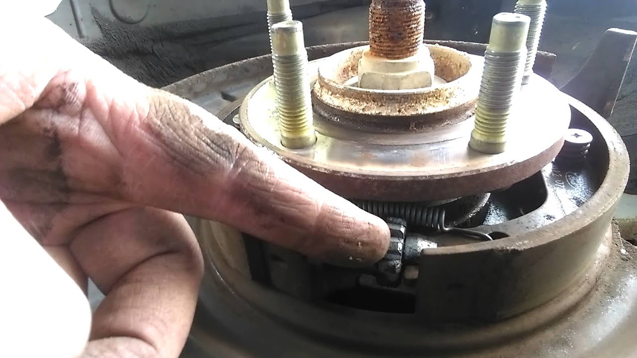 Adjusting the parking brakes on a 2008 Ford Escape