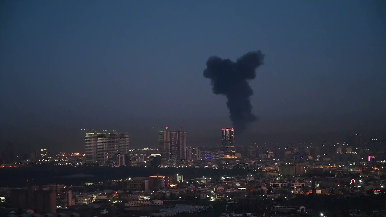 Thick black smoke rising from Iraq airport area hosting US-led troops | AFP