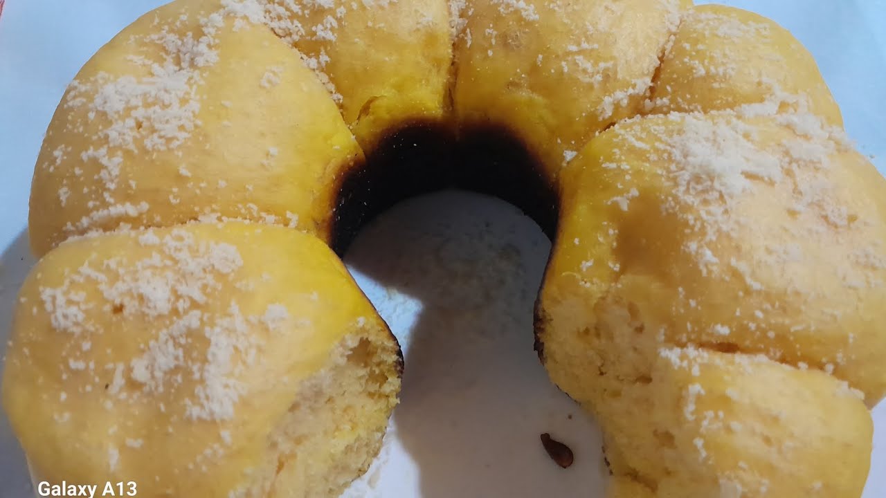 Pão  caseiro Assado em cima do Fogão. 