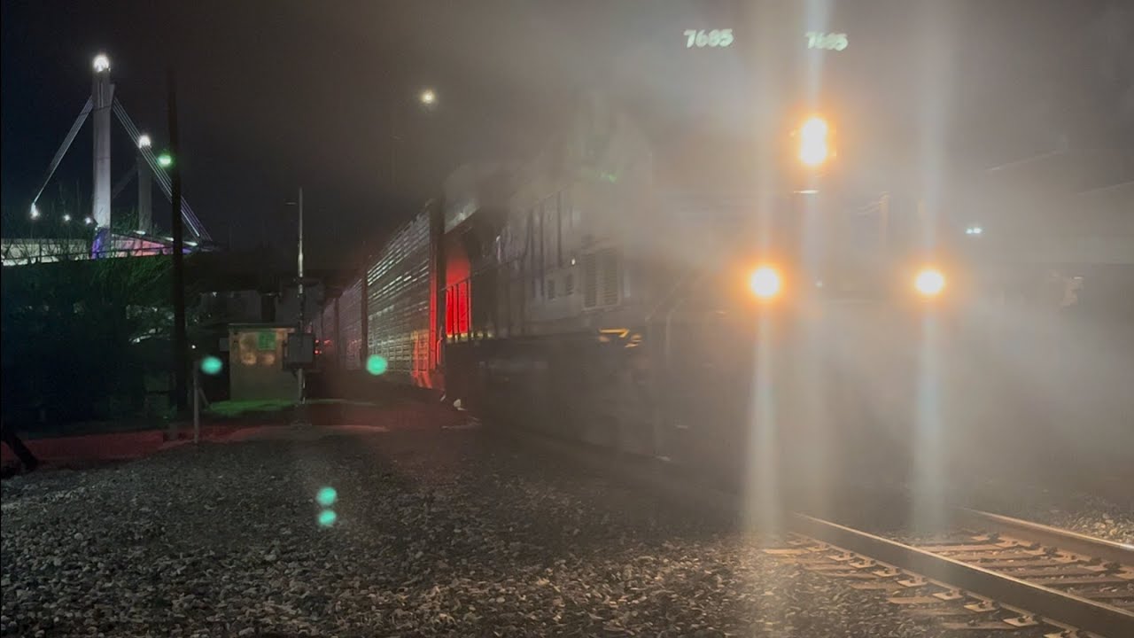 UP 7685 solo leads Autorack train 