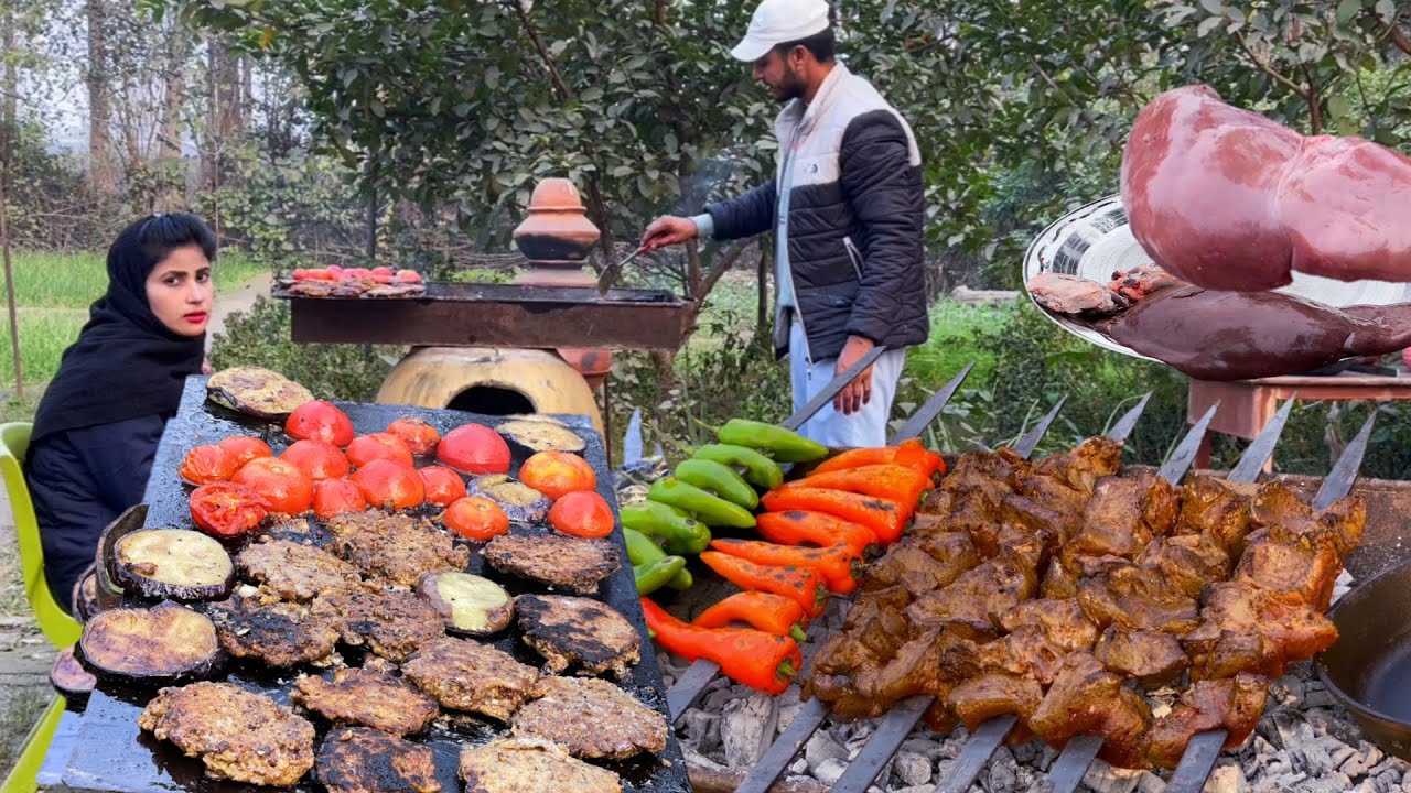 Juicy Kebabs of Liver and Kidney on Charcoal IL Delicious BBQ Treat in outdoor kitchen II
