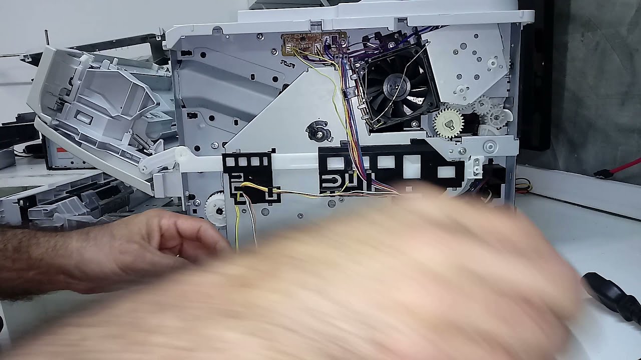 Impressora HP laser P2055dn  Papel parando na saída