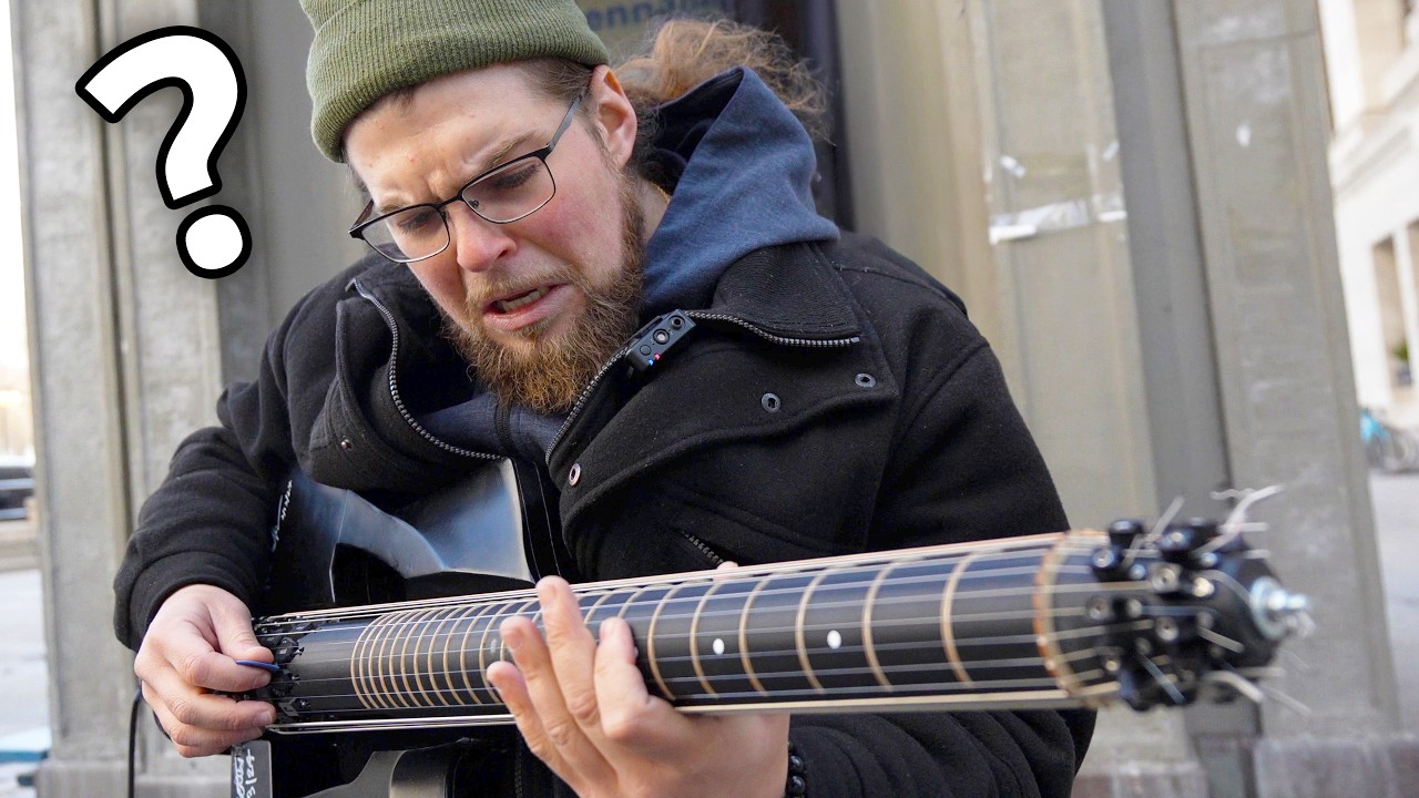Street musician can't believe the guitar I just handed him