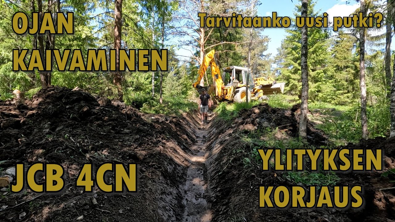 Metsätien ojan ylityksen kunnostus sekä ojan uudelleen kaivaminen. JCB 4CN