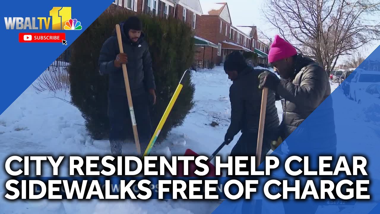 City residents help clear sidewalks of snow, ice for free