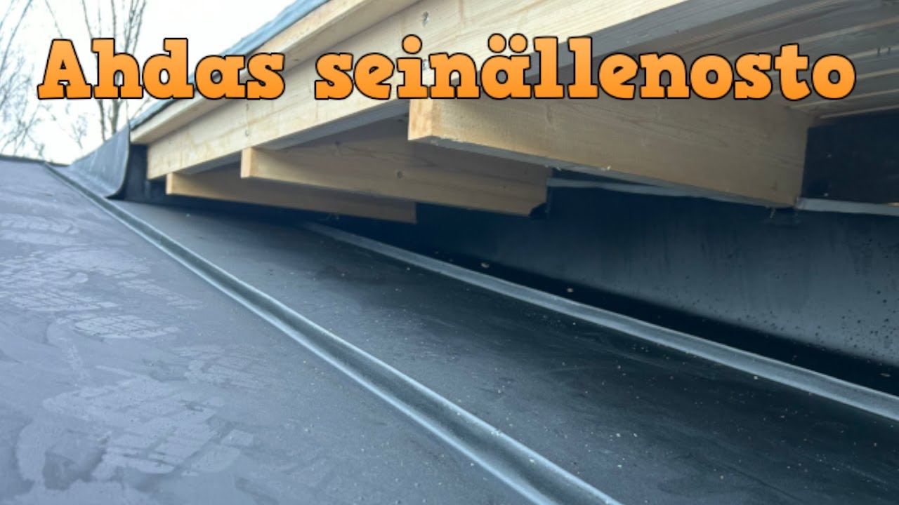 Konesaumakatto ja Pulpettilyhdyn Ahdas seinällenosto