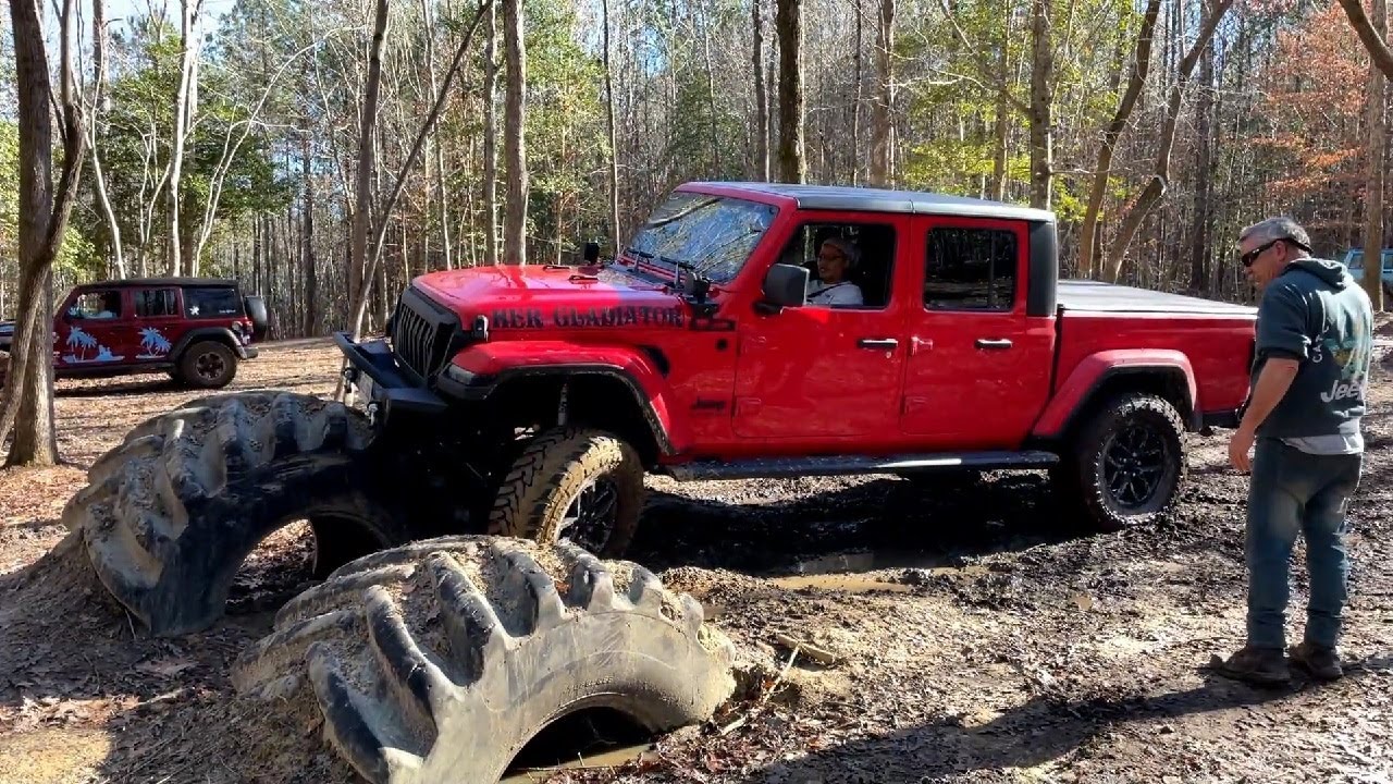 Willys Gladiator VS Lifted JT on 35s. 2 Jeep trucks off road. Who gets stuck first? Stock VS Modded.