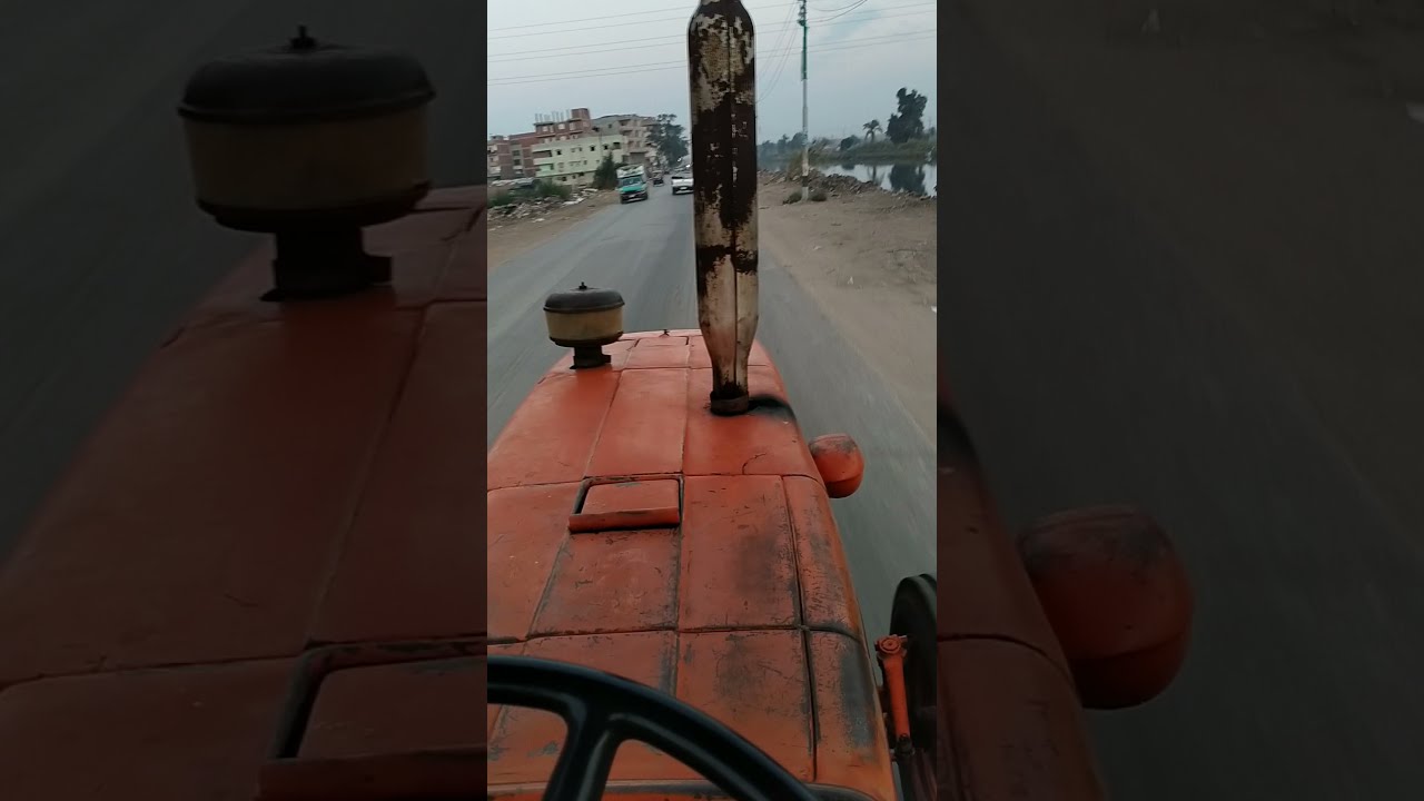 الجرار الروماني و هو محمل و ماشي  ع الطريق بسم الله ماشاء الله