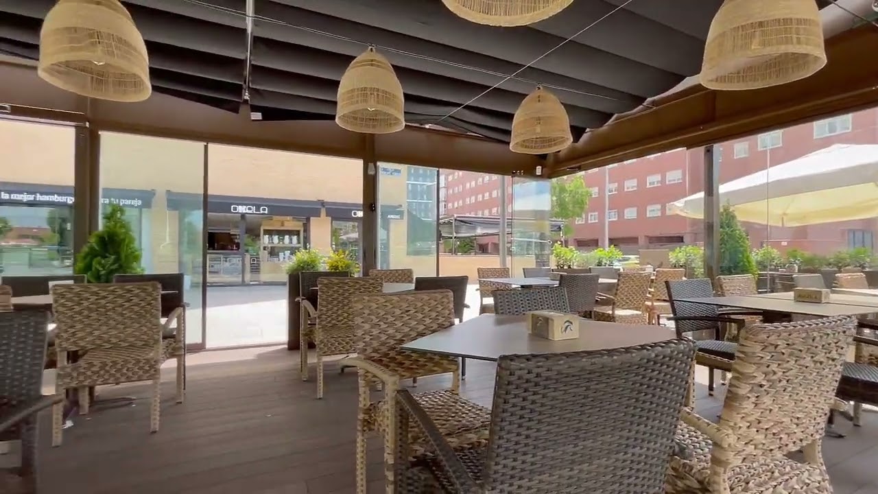 Cerramiento Restaurante Correderas sin perfiles Madrid - Flexiglass