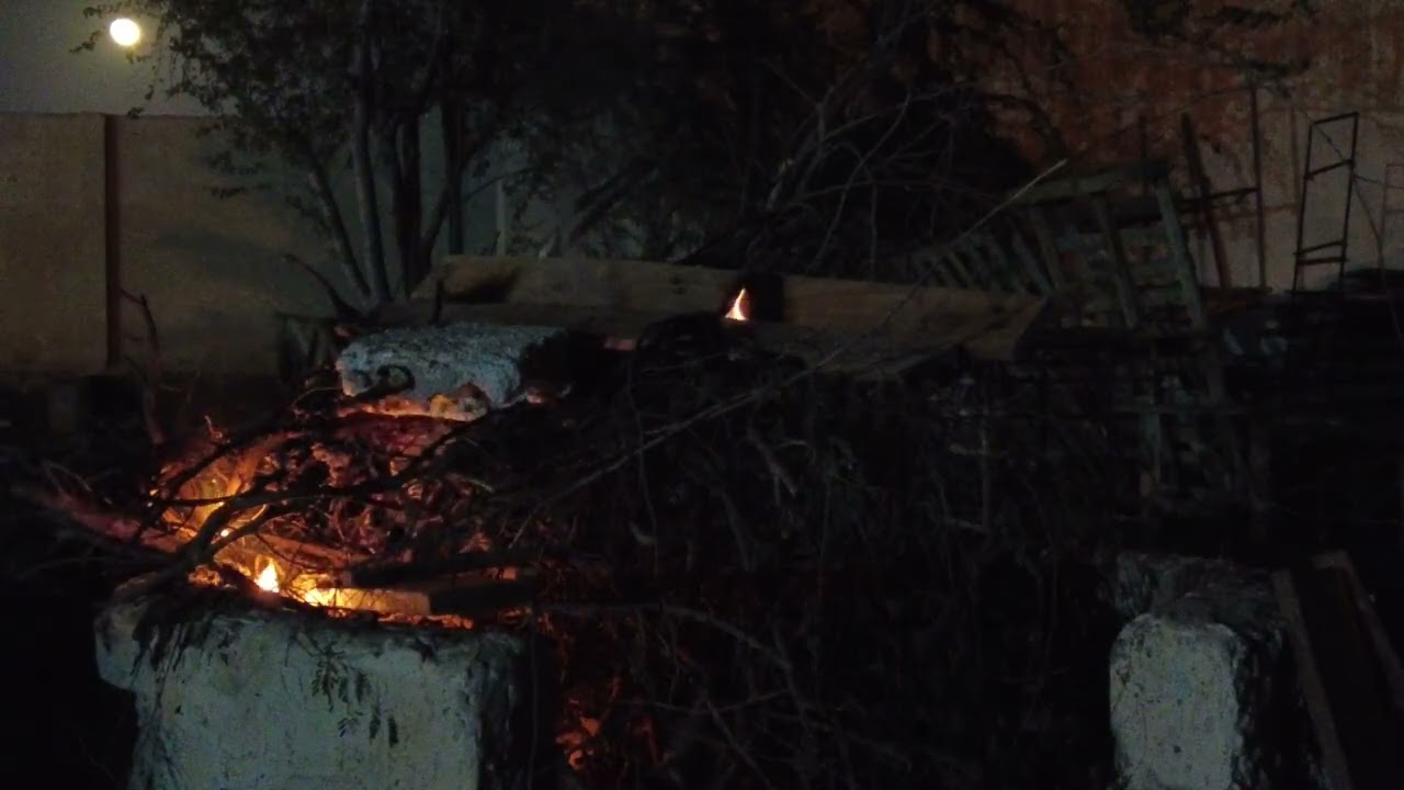 Setting fire and enjoying night with view of fire