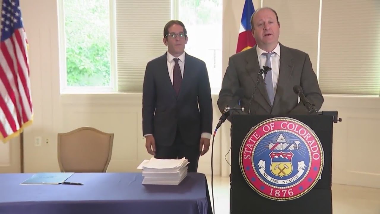 Polis calls special session, announces hiring freeze amid $700 million hole in Colorado budget