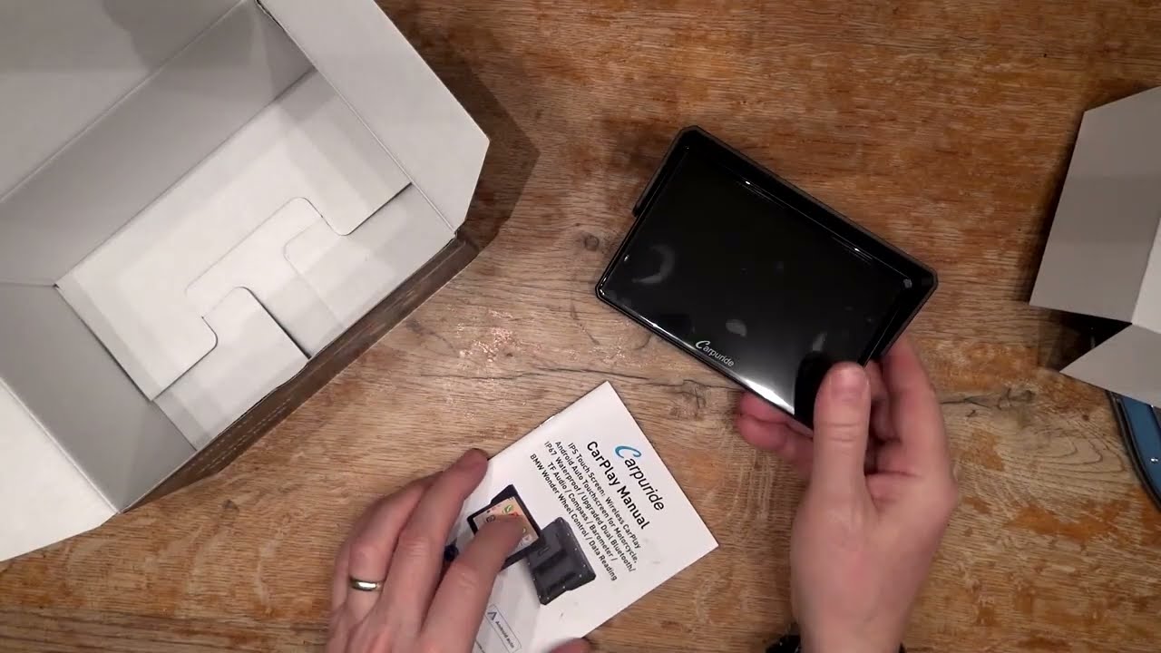 Unboxing Carpuride W 502 BS for BMW with wonder wheel