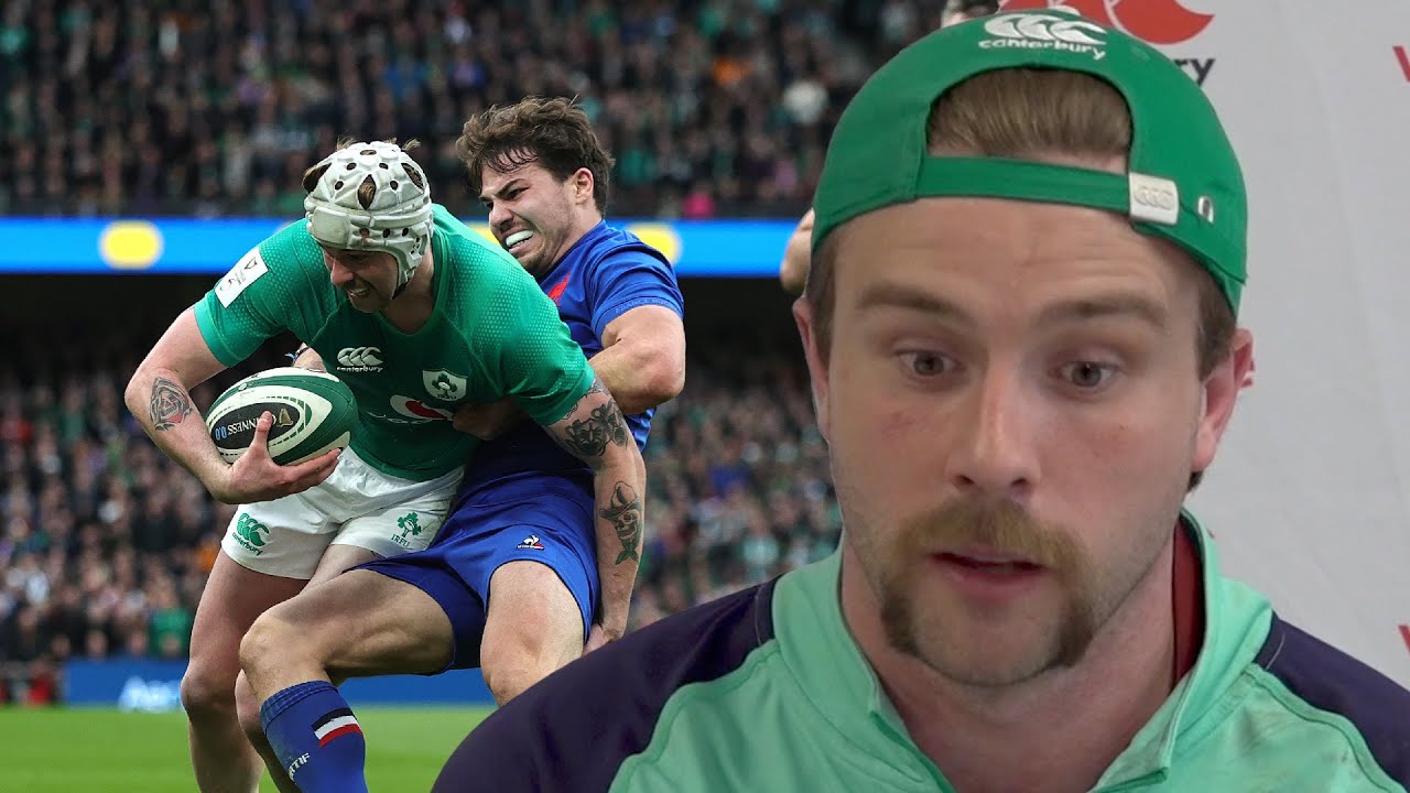 Mack Hansen reacts to Antoine Dupont's try saving tackle on him