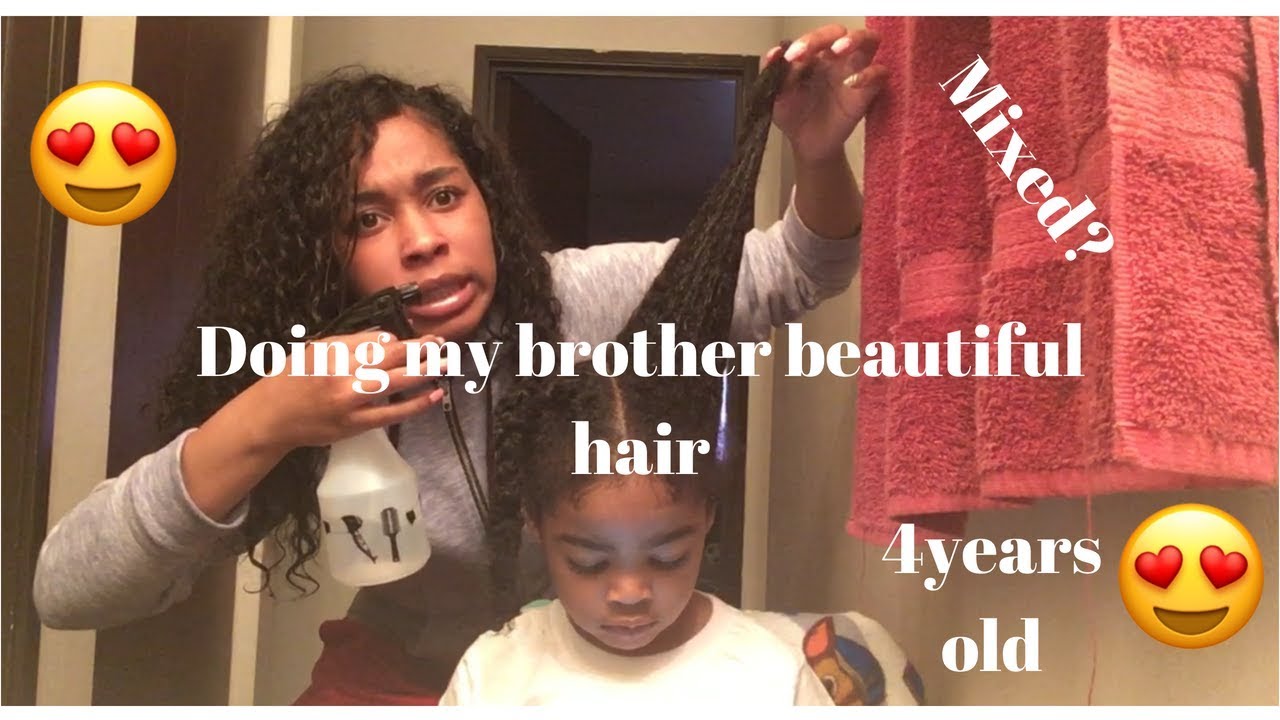 Doing my little brother beautiful hair