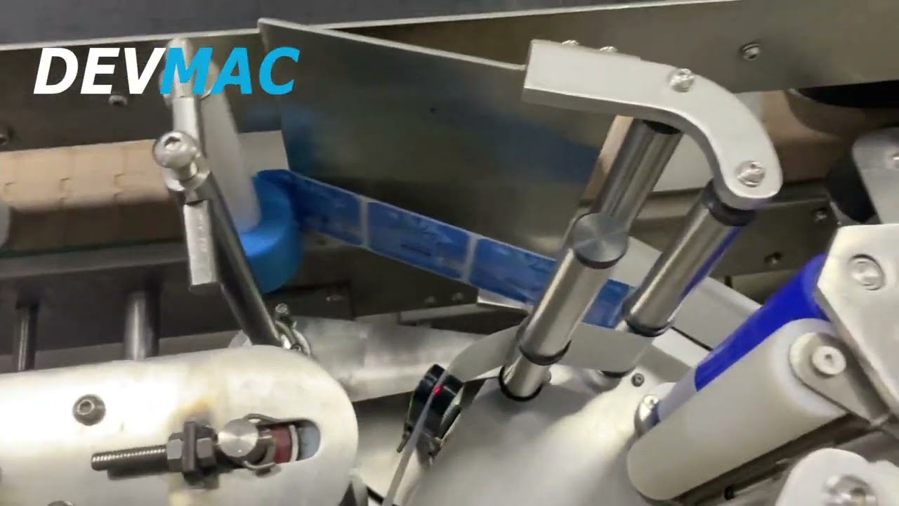 ETIQUETADORA AUTOMATICA PARA ENVASES PLANOS, OVALADOS Y CILINDRICOS