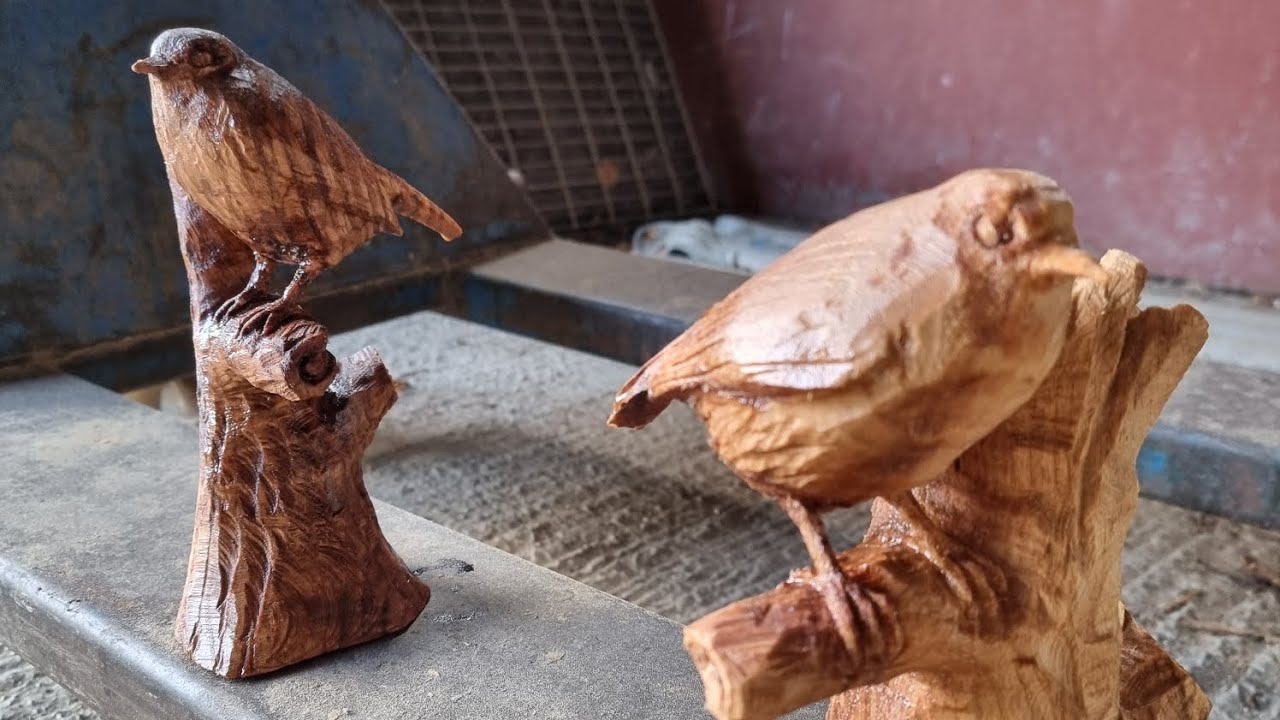 Power carving in miniature. Working on a little life-size Robin with chainsaws and other power tools