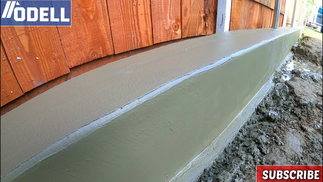 How to Make a Concrete Curb for a Fence