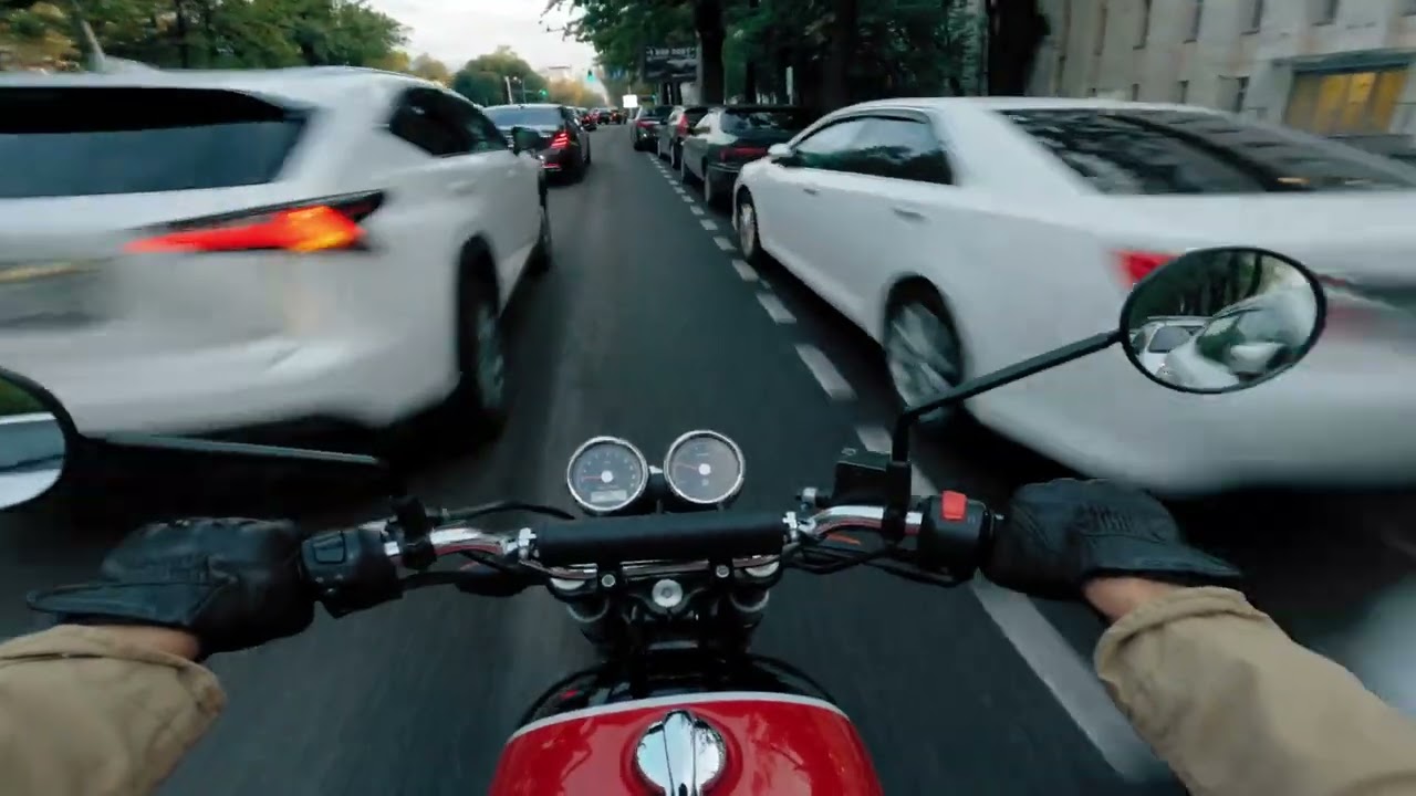 The pure sound of a Royal Enfield Interceptor 650 cruising through the streets of Almaty.